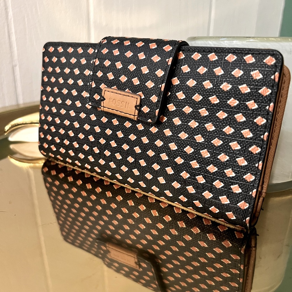 Brown, black, and cream Fossil wallet, looks new